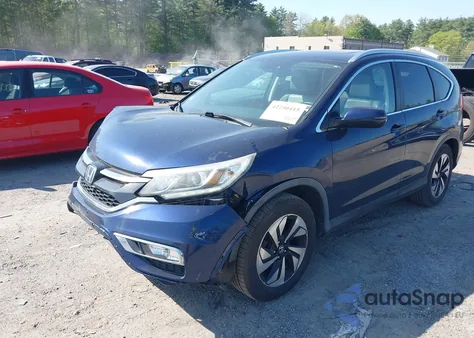 2015 Honda Cr-V Touring z USA, uszkodzony, nr VIN 5J6RM4H9XFL069253